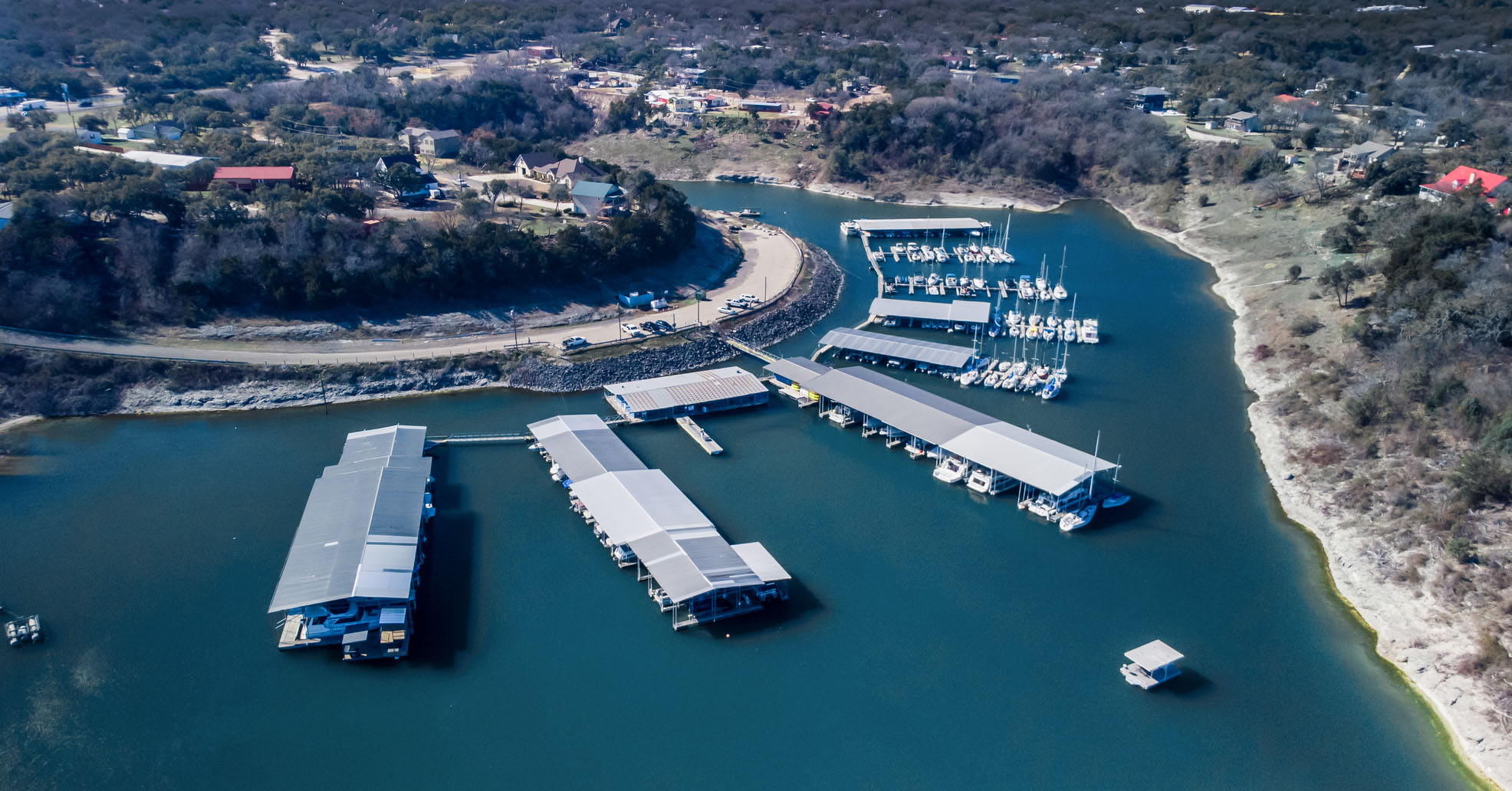DJI_0581-HDR-1A Aerial view of a marina and lake.